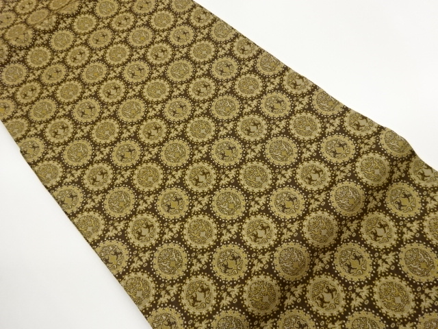 連珠文に向かい動物模様織出し名古屋帯